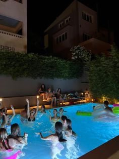 many people are in the pool at night