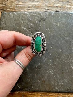 Handmade Royston Turquoise and sterling silver statement ring.  -Ring will fit US Size 8 American Southwestern Vintage style design. Beautiful striking grassy green color with unique matrix. Hand stamped border, and polished Rustic looking patina with high polish finish.  Double split style shank/band. Hand stamped Rising Sun and Arrow hallmark on backside. Turquoise stone is from the Royston mine in Nevada.  100% Sterling silver. --------------------- Every piece will come packaged in a recycle Western Green Turquoise Ring In Sterling Silver, Handmade Green Turquoise Western Ring, Royston Turquoise, Statement Ring Silver, Paper Jewelry, Rising Sun, Green Stone, Ring Ring, Cocktail Ring