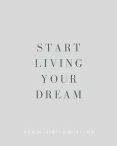 the words start living your dream are shown in grey and white on a gray background