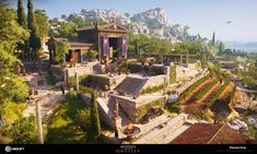 an aerial view of a small village in the middle of a mountain range with lots of trees and bushes