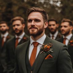 a group of men wearing suits and ties