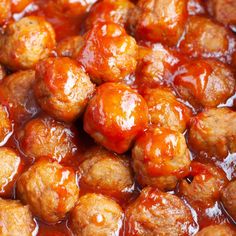 meatballs with sauce in a pan ready to be cooked