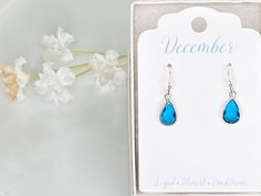 Beautiful Swiss blue crystal dangle earrings. Lovely and sparkly faceted glass. Great gift for December birthday. Silver Plated or Sterling silver hooks available. These gorgeous earrings come in a gift box and an organza bag. They are ready to be given to that special someone. Great gift idea for a birthday, an anniversary, Valentine's Day or any occasion. Great for mothers, sisters, daughters or friends! What a great personalized gift! IF THIS IS A GIFT, PLEASE WRITE THE NOTE (TO, FROM, MESSAG Birthstone Dangle Crystal Earrings For Gift, Birthstone Crystal Dangle Earrings As Gift, Gift Teardrop Dangle Earrings With Faceted Details, Gift Teardrop Crystal Earrings With French Hook, Blue Crystal Earrings With Lever Back For Gift, Faceted Teardrop Dangle Earrings For Gift, Faceted Teardrop Dangle Earrings As Gift, Blue Teardrop Earrings With Lever Back As Gift, Blue Teardrop Earrings Gift