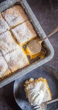 a piece of pie is on a plate with a fork and spoon next to it