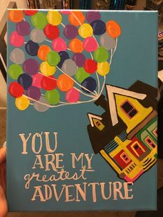 someone is holding up a card that says you are my greatest adventure with balloons on it