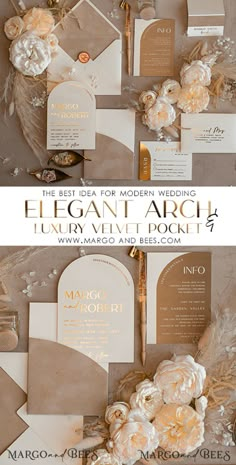 the elegant wedding stationery is set up with gold and white flowers on top of it