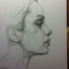 a pencil drawing of a woman's face