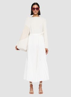 ***FINAL SALE*** The Striped Linen Cotton Siddons Skirt in Ivory by Joseph is a midi length, A-line skirt crafted in a cotton and linen blend with a fitted waistband and removable self-tie belt. 66% Linen, 32% Cotton, 2% Elastane Concealed side zip fastening White Flared Maxi Skirt For Fall, Chic White Pleated Skirt For Fall, Off White Relaxed Skirt For Spring, Off White Relaxed Fit Skirt For Spring, White Lined Maxi Skirt For Fall, White Flowy Pleated Skirt For Fall, Chic White Maxi Skirt For Work, White Pleated Wide Leg Maxi Skirt, White Maxi Skirt For Spring Workwear