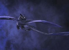 a dragon flying through the air with its wings spread