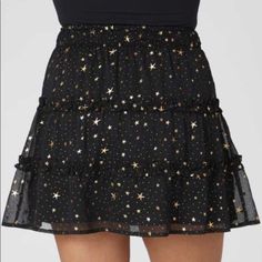 Condition: New With Tags Size: Multiple Sizes!! Color: Black With Gold Stars One Of Our Favorite Trends Ever Are Flirty Skirts In Spring! This Skirt Features A Comfortable Smocked Waistband And Flowy Layered Detailing That Is Perfect For Any Occasion. Pair This With A Bodysuit Or Tank And Some Wedges To Complete Your Look! Fit: Flowy Fit Closure: None, This Skirt Is Slip On Material: Self = 100% Polyester / Lining = 97% Polyester 3% Spandex 15" Length From Waist To Hem Black Star Print Bottoms For Night Out, Starry Night Skirt, Night Skirt, Altard State, Altar'd State, Gold Stars, Starry Night, Womens Skirt, Wedges