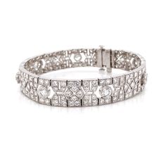 This is a beautiful retro inspired diamond link platinum bracelet. Covered by splendid round cut white natural diamonds 10.21 ct in total. Diamonds are all natural in G-H Color Clarity VS. Platinum 950 metal. Length: 17.4 cm Width. 1 cm Weight: 31 g Exquisite Platinum Diamond Bracelet With Single Cut Diamonds, Wedding Diamond Bracelet With Pave Setting In Platinum, Wedding Platinum Diamond Bracelet With Pave Setting, Exquisite Platinum Tennis Bracelet With Diamond Accents, Exquisite Platinum Diamond Bracelet With Brilliant Cut, Exquisite Platinum Diamond Cut Bracelet, Exquisite Diamond Cut Platinum Bracelet, Exquisite Hand-set Platinum Diamond Bracelet, Exquisite Hand-set Diamond Platinum Bracelet