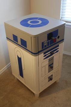 a cardboard box shaped like a star wars r2d2 machine