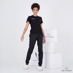 Style your working and everyday clothes with this crew neck t-shirt and comfortable scrub pants. Made of high-quality cotton fabric the set will become an essential part of one's working wardrobe. A relaxed fit will suit different figure shapes and will add comfort. The t-shirt is completed with trendy embroidery in a minimalist design. The skinny pants are very comfortable and fit perfectly. The pockets are quite roomy and functional. The pants have a zipper closure and elastic insert with the Sporty Cotton T-shirt For Work, Sporty Crew Neck T-shirt For Workwear, Esthetician Uniform, Beautician Uniform, Working Wardrobe, Trendy Embroidery, Scrubs Uniform, Everyday Clothes, Crew Neck Tshirt