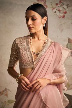 Elevate your style with this exquisite dusky pink ensemble. The heavily net-embroidered blouse complements the chiffon drape sari beautifully, while the organza ruffle adds a touch of elegance. Perfect for those who appreciate timeless sophistication with a modern twist. Drape Sari, Saree Chiffon, Fashionable Saree, Pink Anarkali, Saree Wearing, Full Sleeve Blouse, Organza Blouse, Embroidered Crop Tops, Drape Saree