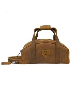 a brown leather duffel bag with a handle and zipper on the side, sitting against a white background