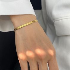 Our Sabrina bracelet is a sleek must-have piece. Made with a classic chain silhouette, use this essential as the base of your bracelet layers Details: 18k Gold Plated Stainless Steel Length: 17 cm Chain Extender: 6 cm Hope Bracelet, Bones Bracelet, Gold Snake Chain, Gold Link Bracelet, Hand Necklace, Snake Chain Bracelets, Snake Bracelet, Minimalist Bracelet, Gold Snake