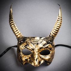 This Devil Eyes Mask With Long Horn Is Made From Plastic Molding And Hand Painted An Matte Black Finish. The Mask Is About 5" Tall And 6.5" Wide. The Masquerade Mask Will Make A Great Halloween Party Costume Accessory. Product Features &Bull; Made From Plastic With Molding And Hand Painted. &Bull; Great For A Masquerade Ball Or Venetian Halloween Costume &Bull; Features Mythological Beasts &Bull; The Mask Is Approximately 5" Tall And 6.5" Wide Color: Black Gold This Mask Will Fit Most Adults. Kd Black Mardi Gras Masks And Prosthetics, Horned Black Masquerade Mask For Halloween, Gold Gothic Masquerade Mask For Carnival, Black And Gold Masquerade Mask, Black Horned Masquerade Mask, Masqurade Mask With Horns, Party Eyes, Evil Demons, Devil Eye