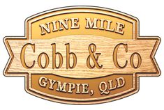 a wooden sign that says cobb and co gym, qld with the words'nine mile