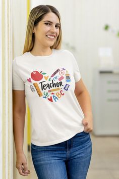 Handmade item Made to order Teacher T Shirt Gift for Teacher T-Shirt Educator Shirt Teacher Appreciation Week Teacher Graphic Tees Heart Shaped Teacher T Shirt MATERIALS ↠  Printed on a commercial printer with MADE IN USA INKS, safe for all inducing Toddlers.  ↠ All our simple solid color T Shirts like White, Black and Red are 100% Cotton. ↠ All our Heathered Color T Shirts are cotton/polyester blend and they are super comfy soft! ↠ Soft and High-Quality Fabric ↠ Sueded Jersey ↠ Pre-shrunk ↠ Taped shoulder-to-shoulder ↠ Tear away label ↠ Side Seamed ↠ Retail fit SIZE ↠ The shirts are unisex size--not women's fitted shirts. Womens can downsize their regular size if they want a fitted look. SHIPPING AND PRODUCTION TIME ↠ Production time is 1-2 business days (depending on proof approval). ↠ S Fitted Shirts, Teacher Appreciation Week, Gift For Teacher, Teacher Tshirts, Teacher Appreciation, Tshirt Colors, Teacher Gifts, Workout Shirts, Quality Fabric