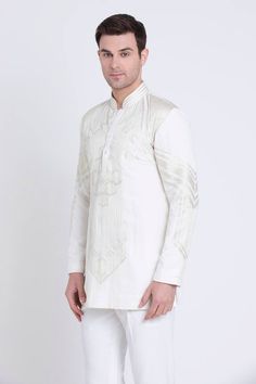 Ivory silk kurta with resham embroidery in geometric pattern and mandarin collared neckline. Paired with a pant. - Aza Fashions Elegant Long Sleeve Kurta With Geometric Embroidery, Eid Straight Kurta With Geometric Embroidery, White Silk Kurta With Embroidered Border, Traditional Long Sleeve Sherwani With Geometric Embroidery, Eid Kurta With Geometric Embroidery, White Silk Nehru Jacket For Eid, Eid Geometric Embroidery Straight Kurta, Embroidered White Nehru Jacket For Traditional Ceremonies, White Silk Sherwani For Diwali