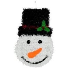 a snowman ornament hanging on a white wall