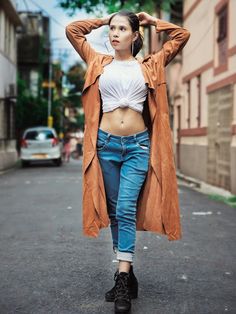 Trendy Long Outerwear With Pockets, Long Brown Outerwear For Spring, Brown Long Outerwear For Spring, Long Brown Spring Outerwear, Trendy Long Spring Outerwear, Fitted Long Coat Trendy Outerwear, Trendy Long Outerwear For Fall, Trendy Long Brown Coat, Trendy Single-breasted Long Coat