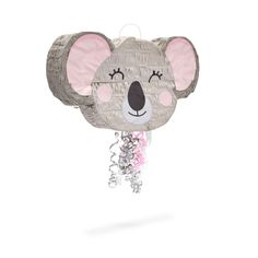 a paper cut out of a koala bear hanging from a chain on a white background