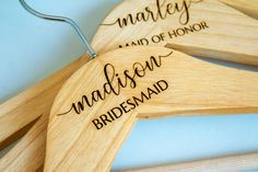 personalized wooden hangers with names on them for bridesmaids and grooms