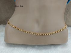 * Beautifully designed gold color belly chain. * can be used with belly dance costumes and saris. * Adjustable from 25 to 41 inches waist. Waist Band Jewellery Indian, Golden Waist Chain, Waist Chain Indian Saree, Gold Waist Chain Indian, Gold Waist Belt Indian, Hip Chain For Saree, Waist Chain Indian, Gold Waist Belt, Cotton Dress Indian