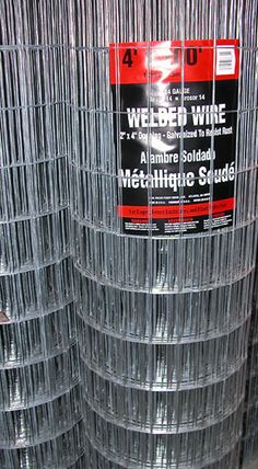 several stacks of welded wire are stacked on top of each other