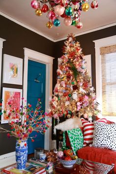 a decorated christmas tree in a living room