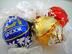 assorted chocolate candies wrapped in cellophane