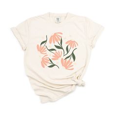 Looking for a cute versatile top to wear this summer? Make sure to grab one of our Pink Daisies garment dyed graphic tees! This soft and comfortable graphic tee is the perfect top for any outfit. It can be paired with biker shorts, jeans, or even a simple skirt/dress! This tee is true-to-size, so be sure to order your regular t-shirt size! If you are looking for a more oversized look, make sure to size up! Soft-washed Cotton T-shirt For Summer, Spring Graphic Tee Soft-washed, Spring Soft-washed Graphic Tee, Soft-washed Tops For Spring And Summer, Spring Soft-washed Summer T-shirt, Spring Soft-washed T-shirt With Crew Neck, Soft-washed Spring T-shirt With Crew Neck, Spring Soft-washed T-shirt, Acid Wash T-shirt For Everyday Spring Wear