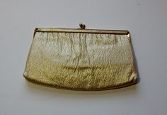 Vintage Purse Metallic Gold Handbag or Clutch Mid Century Fashion Accessory 60's Evening Bag Pumpkin Lining by OffbeatAvenue on Etsy Retro Gold Clutch Bag, Gold Retro Clutch Bag, Retro Gold Evening Bag, Vintage Gold Pouch Bag, Retro Gold Rectangular Evening Bag, Vintage Gold Coin Purse For Party, Vintage Gold Clutch For Everyday Use, Retro Gold Bags For Events, Retro Gold Bag As A Gift