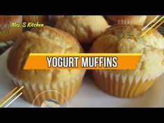 some muffins are sitting on a plate with the words yogurt muffins