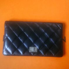 Chanel , Crinkle Lambskin Wallet Bi-Fold Long Wallet Excellent Pre-Loved Condition No Rubbing No Coin Residue A Little Bit Of Discolor On The Silver Chanel Logo H 7.08 Inch W 4.13 Inch D .078 Inch 8 Credit Card Slots 1 Coin Compartment 4 Note/ Receipt Compartment Logo H, Chanel Logo, Chanel Bags, Long Wallet, Card Slots, Slots, Credit Card, Coin, Chanel