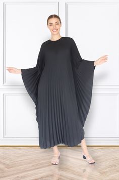 "A special collection with pleated kaftan in fan-style will bring the best \"new\" look for any occasions you may attend. Classic but chic !. It's totally smoothly flowy, soft and gentle touch. FEATURES - Black, Dark Black, Super Black - Pleated - Personal Custom Made - Full Length Kaftan  - Designer Silk Kaftan - Plus Size and Custom Length - Resort Wear, Beach Wear, Lounge Wear, Pool Cover Up Kaftan - Boat Neck -------------------------------- DETAIL  * The maximum length : 130-133 CM ( please Elegant Oversized Abaya, Elegant Oversized Kaftan, Elegant Oversized Spring Kaftan, Elegant Oversized Long Abaya, Elegant Long Oversized Abaya, Elegant Long Pleated Maxi Dress, Elegant Spring Kaftan With Batwing Sleeves, Elegant Cape-shaped Kaftan, Elegant Flowy Black Kaftan