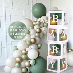 balloons are arranged in the shape of letters and numbers for baby's first birthday