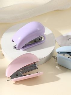 three different types of staplers sitting on top of each other