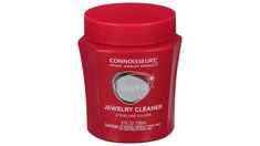 silver jewelry cleaner in red container on white background