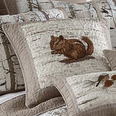 an image of a bed with squirrels on it