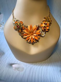 Orange and Gold Floral Bib Vintage Jewelry Assemblage Necklace | Etsy Vintage Orange Metal Necklaces, Vintage Orange Metal Necklace, Bohemian Gold Jewelry With Flower Decoration, Gold Flower-shaped Costume Necklace, Gold Flower Costume Jewelry Necklace, Gold Flower-shaped Costume Jewelry Necklace, Vintage Orange Flower Jewelry, Orange Vintage Flower Jewelry, Vintage Orange Jewelry For Party