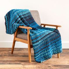 a chair with a blanket on top of it