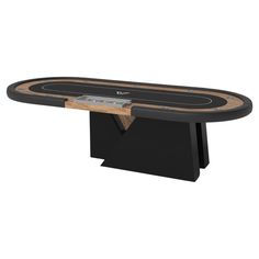 a black and wood poker table with an electronic device on top