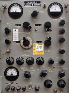 the control panel is full of knobs and gauges for different types of instruments