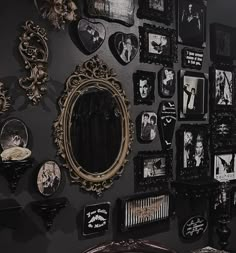 there are many pictures on the wall in this room and it is very interesting to see