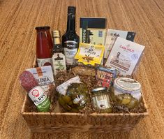 Discover the true essence of Italy with this thoughtfully curated gift basket, featuring a handpicked selection of 12-14 premium imported Italian delicacies.  Inside, you'll find a selection of rich olive oils, flavorful pestos, hand-crafted pasta, savory sottoli (marinated vegetables), and traditional sauces.  Each imported item is chosen for its quality, authenticity, and has been handpicked to showcase true Italian flavors and ingredients.  Some typical items inside the LARGE WEAVED BASKET (b Italian Raffle Basket Ideas, Pasta Gift Basket Ideas, Italian Gift Basket Ideas, Pasta Gift Basket, Italian Gift Baskets, Pasta Gifts, Weaved Basket, Theme Baskets, Gourmet Pasta