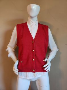 Good vintage condition  Marked size medium  Measurements  Shoulders 14 Chest 40 CB 21 deep red color Sag Harbor acrylic Knit Button Sweater Vest For Fall, Knit Sweater Vest With Buttons For Fall, Elegant Fall Sweater Vest With Buttons, Fitted Red Sweater With Buttons, Fitted Red Sweater Vest For Winter, Classic Red Winter Vest, Red Knit Sweater Vest For Fall, Classic Red Vest For Fall, Classic Cable Knit Sweater Vest For Fall