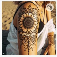 a woman's arm with a sunflower on it and the words serenity grace