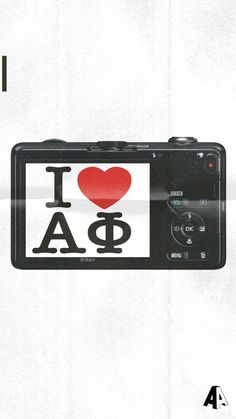 a camera with an i love aa sticker on the front and back of it